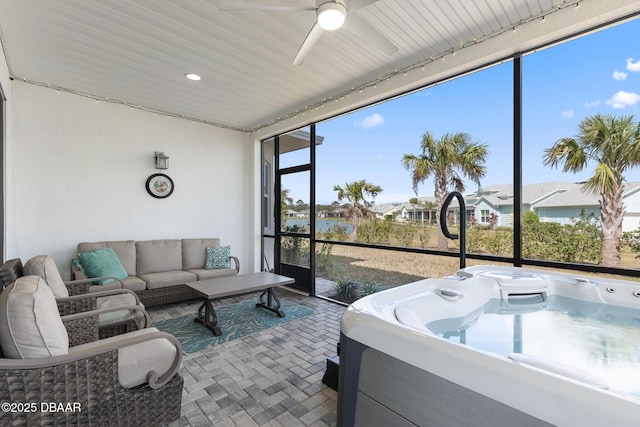 418 Good Life Way, Daytona Beach, FL 32124 - sunroom with ceiling fan and a hot tub