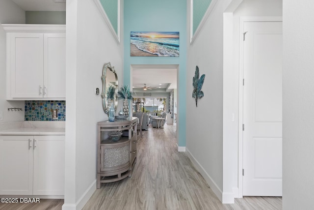 418 Good Life Way, Daytona Beach, FL 32124 - hallway with light wood-type flooring