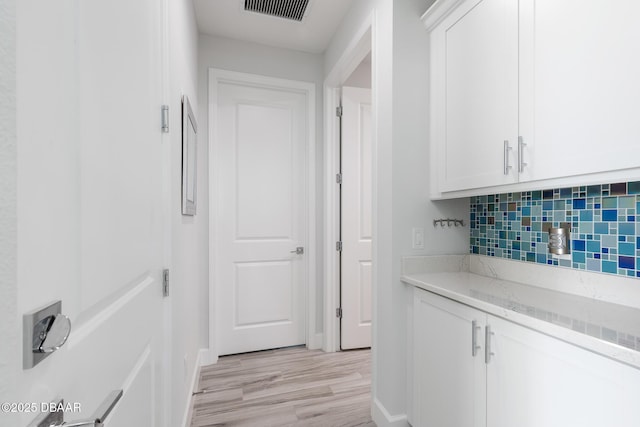 418 Good Life Way, Daytona Beach, FL 32124 - corridor featuring light hardwood / wood-style floors