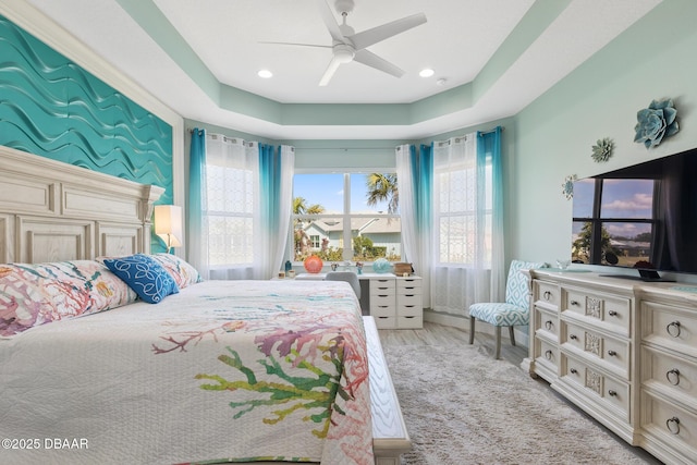 418 Good Life Way, Daytona Beach, FL 32124 - bedroom with multiple windows, a raised ceiling, and ceiling fan