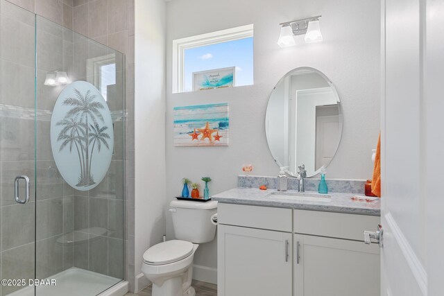 418 Good Life Way, Daytona Beach, FL 32124 - bathroom with vanity, a shower with door, and toilet