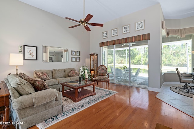 850 Westlake Dr, Ormond Beach, FL 32174 - living room with plenty of natural light, high vaulted ceiling, ceiling fan, and wood-type flooring