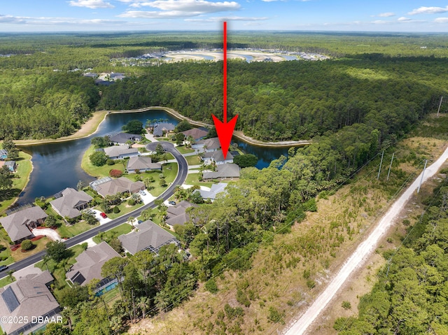 850 Westlake Dr, Ormond Beach, FL 32174 - bird's eye view featuring a water view, a residential view, and a wooded view