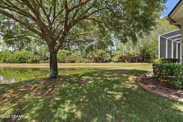 850 Westlake Dr, Ormond Beach, FL 32174 - view of yard featuring glass enclosure and a water view