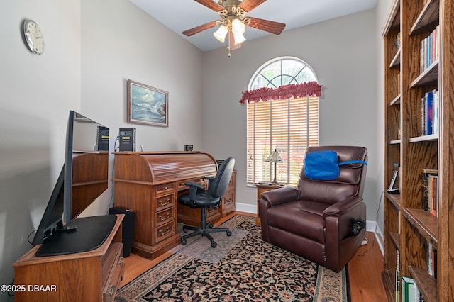 850 Westlake Dr, Ormond Beach, FL 32174 - office area with baseboards, ceiling fan, and wood finished floors