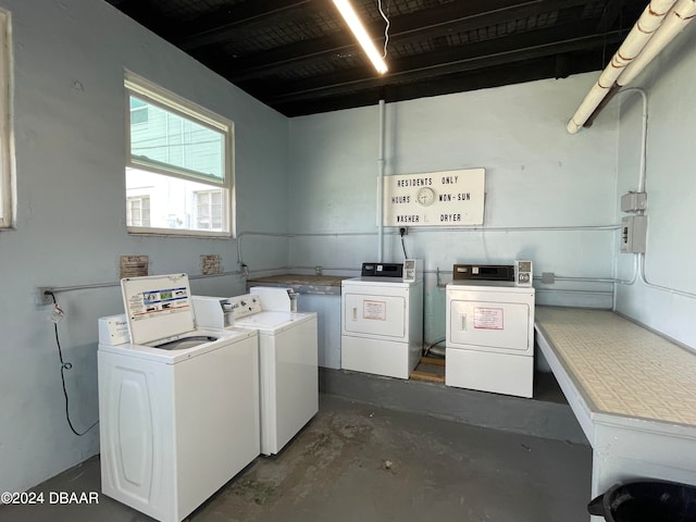 washroom featuring independent washer and dryer