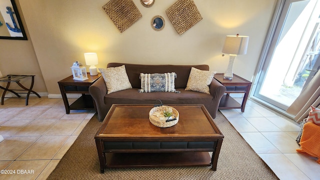 219 S Atlantic Ave Unit 135, Daytona Beach, FL 32118 - living room with light tile patterned flooring and baseboards