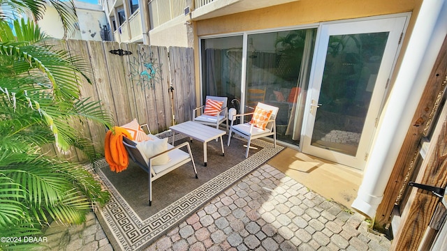 219 S Atlantic Ave Unit 135, Daytona Beach, FL 32118 - view of patio / terrace featuring fence