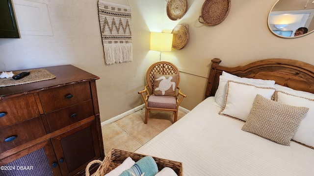 219 S Atlantic Ave Unit 135, Daytona Beach, FL 32118 - tiled bedroom with baseboards