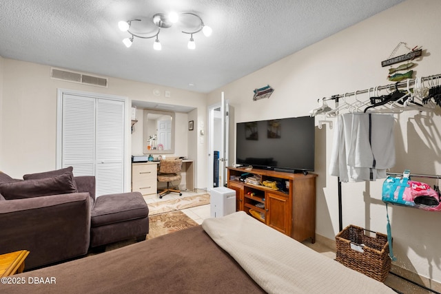 living room with a textured ceiling