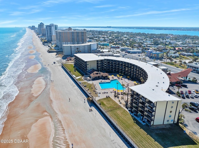 bird's eye view with a beach view and a water view