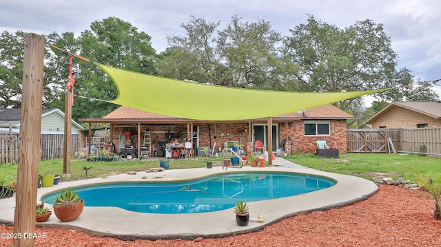 view of swimming pool with a patio area