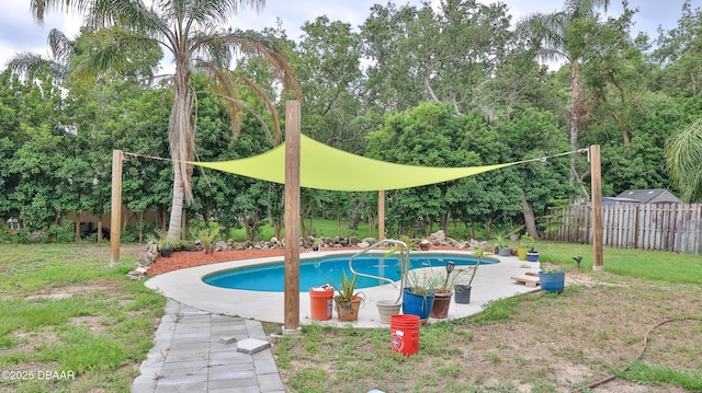 view of swimming pool with a patio
