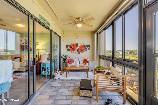 456 Bouchelle Dr Unit 104, New Smyrna Beach, FL 32169 - sunroom / solarium featuring ceiling fan