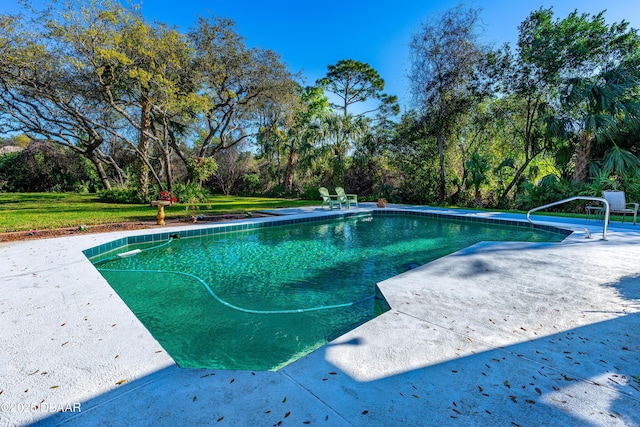 outdoor pool featuring a patio area