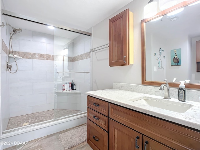 bathroom featuring vanity and walk in shower