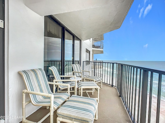 2425 S Atlantic Ave Unit 1004, Daytona Beach Shores, FL 32118 - balcony featuring view of water and beach