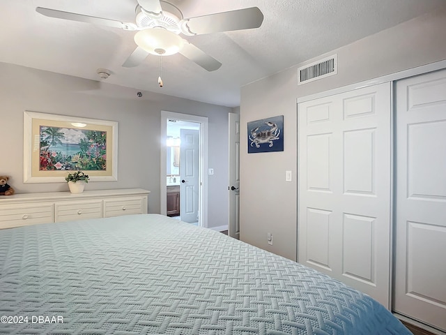 2425 S Atlantic Ave Unit 1004, Daytona Beach Shores, FL 32118 - bedroom with a ceiling fan and a closet