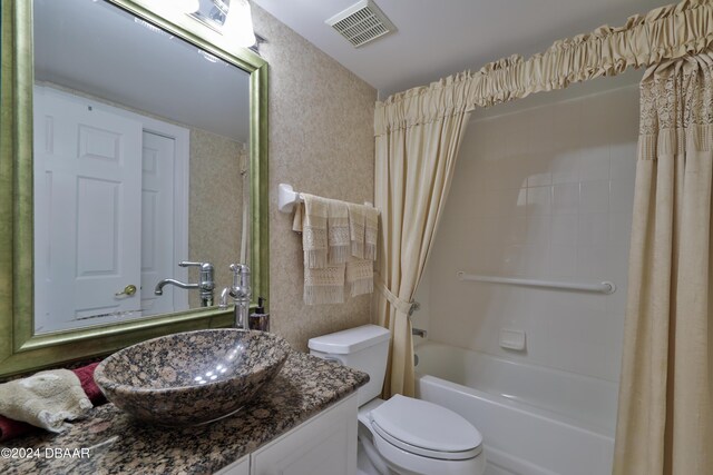 4631 S Atlantic Ave Unit 8101, Ponce Inlet, FL 32127 - full bath featuring vanity, shower / bath combination with curtain, and toilet
