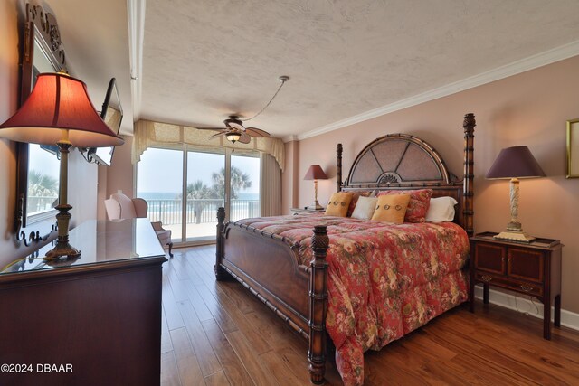 4631 S Atlantic Ave Unit 8101, Ponce Inlet, FL 32127 - bedroom featuring access to outside, wood finished floors, ornamental molding, and a textured ceiling