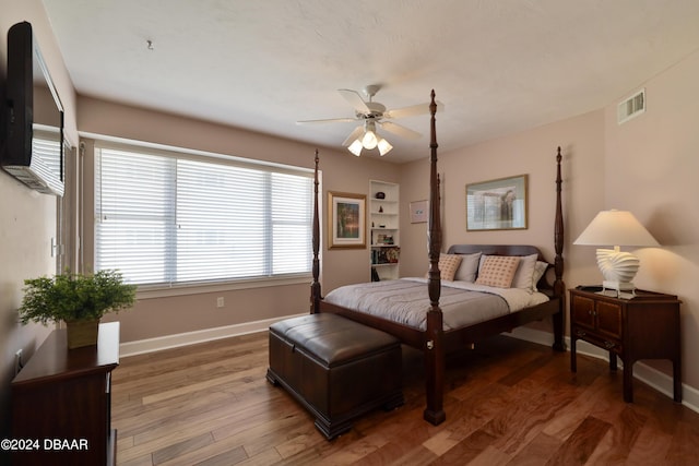 4631 S Atlantic Ave Unit 8101, Ponce Inlet, FL 32127 - bedroom with baseboards and wood finished floors
