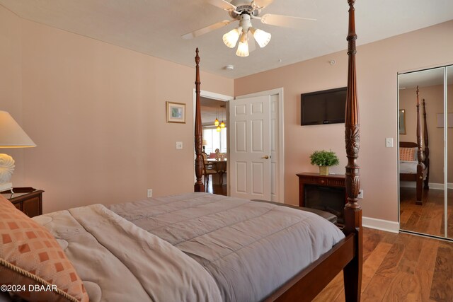 4631 S Atlantic Ave Unit 8101, Ponce Inlet, FL 32127 - bedroom featuring wood finished floors, baseboards, and a ceiling fan