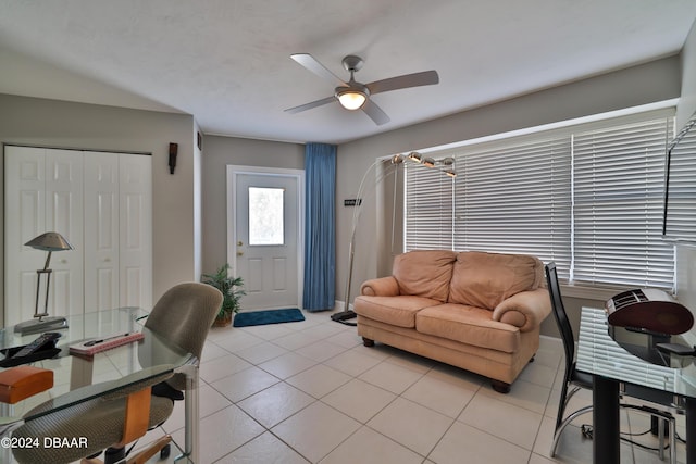 4631 S Atlantic Ave Unit 8101, Ponce Inlet, FL 32127 - living area featuring a ceiling fan, light tile patterned flooring, and baseboards