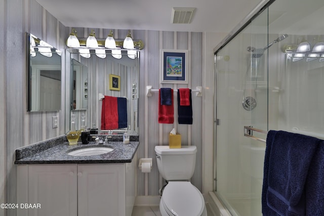 4631 S Atlantic Ave Unit 8101, Ponce Inlet, FL 32127 - bathroom featuring a stall shower, vanity, toilet, and wallpapered walls