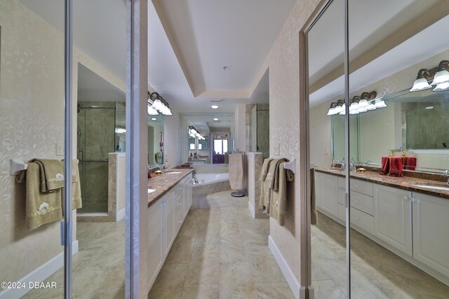 4631 S Atlantic Ave Unit 8101, Ponce Inlet, FL 32127 - full bathroom featuring vanity, a bath, and a stall shower