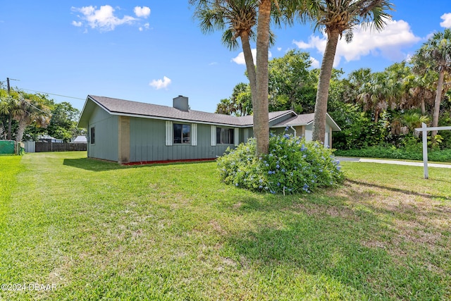 view of front of property with a front lawn