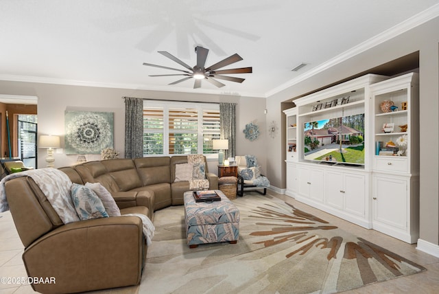 living room featuring crown molding and ceiling fan