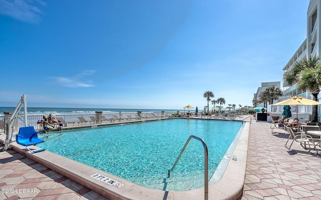 2700 N Atlantic Ave Unit 905, Daytona Beach, FL 32118 - community pool with a patio