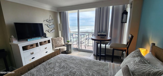 2700 N Atlantic Ave Unit 905, Daytona Beach, FL 32118 - bedroom featuring floor to ceiling windows, access to outside, and wood finished floors