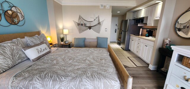 2700 N Atlantic Ave Unit 905, Daytona Beach, FL 32118 - bedroom with light wood-type flooring