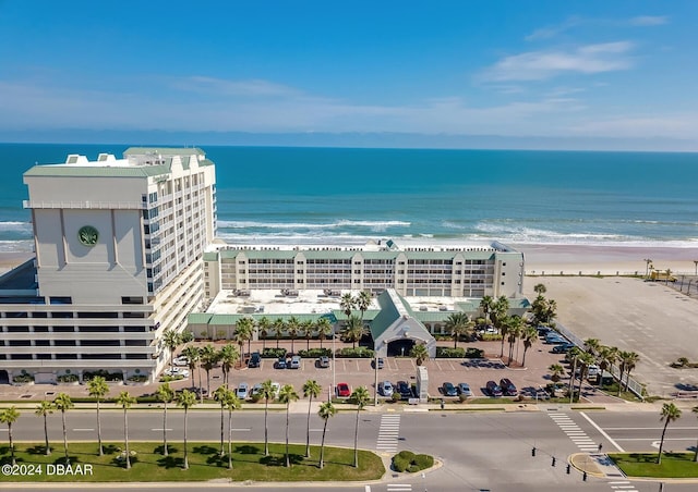 aerial view with a beach view and a water view