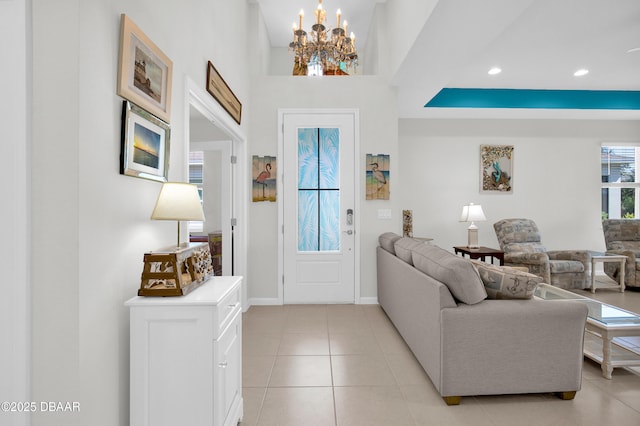 914 Attitude Ave, Daytona Beach, FL 32124 - living room with recessed lighting, light tile patterned floors, an inviting chandelier, and baseboards