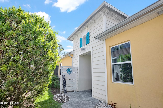 914 Attitude Ave, Daytona Beach, FL 32124 - view of side of home with stucco siding