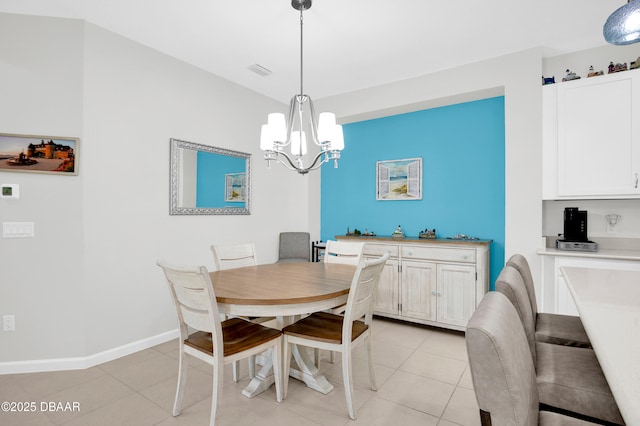 914 Attitude Ave, Daytona Beach, FL 32124 - dining space featuring baseboards, visible vents, an inviting chandelier, and light tile patterned floors