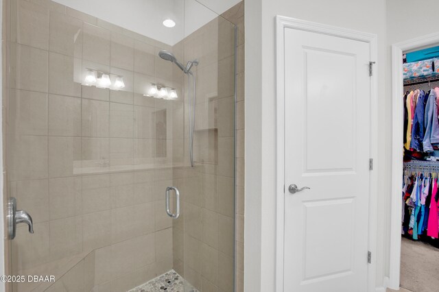 914 Attitude Ave, Daytona Beach, FL 32124 - full bathroom featuring a walk in closet and a shower stall