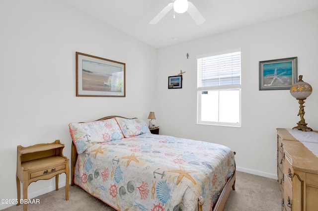 914 Attitude Ave, Daytona Beach, FL 32124 - bedroom featuring light carpet, baseboards, and ceiling fan