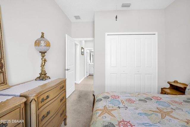 914 Attitude Ave, Daytona Beach, FL 32124 - bedroom featuring carpet flooring, visible vents, and a closet