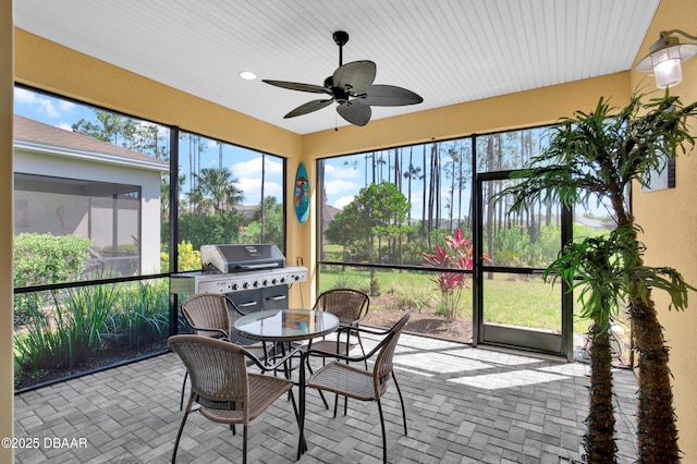 914 Attitude Ave, Daytona Beach, FL 32124 - sunroom / solarium with recessed lighting, ceiling fan, and outdoor dining area