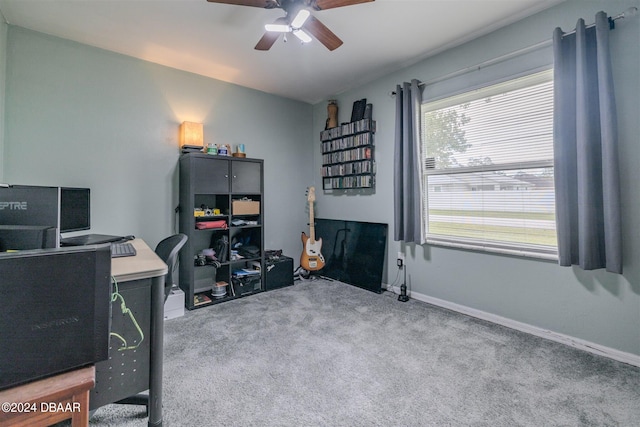 office with carpet flooring and ceiling fan