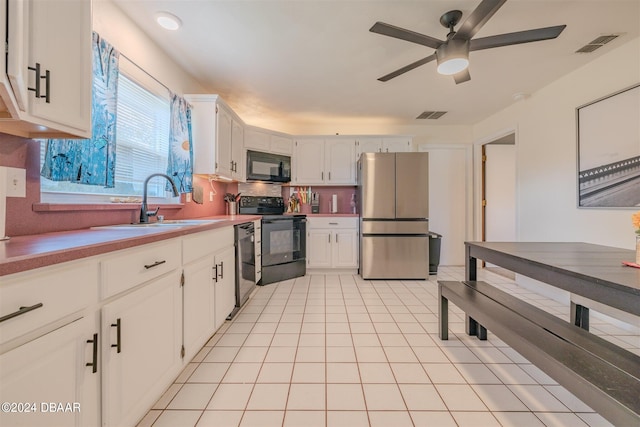 kitchen featuring black appliances, sink, ceiling fan, and white cabinets