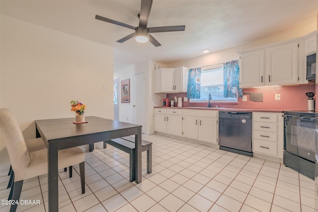 kitchen with black appliances, sink, light tile patterned floors, ceiling fan, and white cabinetry