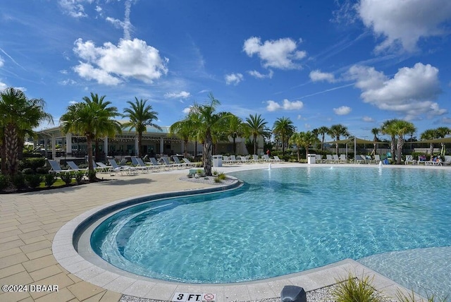 view of swimming pool featuring a patio