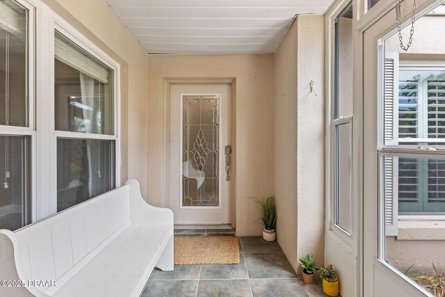 12 Big Buck Trl, Ormond Beach, FL 32174 - view of exterior entry with stucco siding