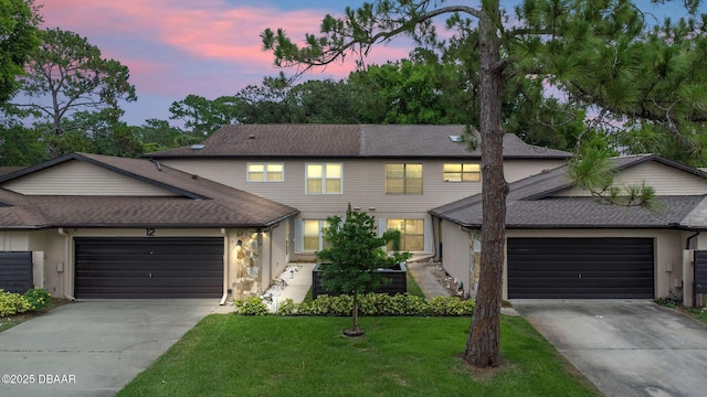 12 Big Buck Trl, Ormond Beach, FL 32174 - view of front of property featuring concrete driveway, a garage, and roof with shingles