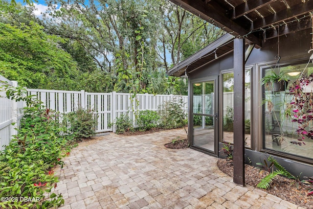 12 Big Buck Trl, Ormond Beach, FL 32174 - fenced backyard with a patio area