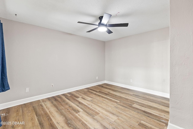 12 Big Buck Trl, Ormond Beach, FL 32174 - unfurnished room with ceiling fan and wood finished floors
